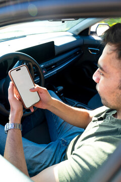 Driver scrolling cell phone 