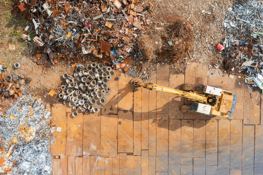 Aerial View of Recycling Yard with Electromagnet Crane Sorting M