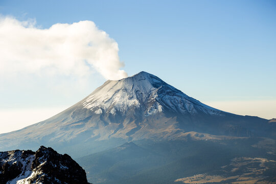 Popocatepetl volcano emitting smoke and ash in mexico