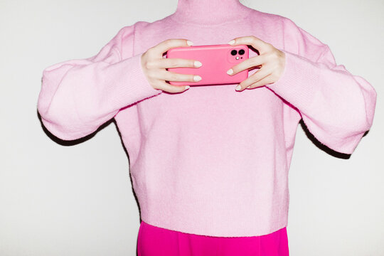 All pink fashion style outfit and pink mobile phone smartphone