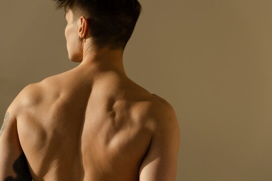 A man with a bulky back