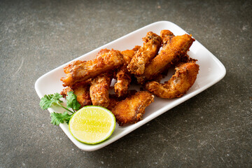 Fried Snapper Belly on white plate