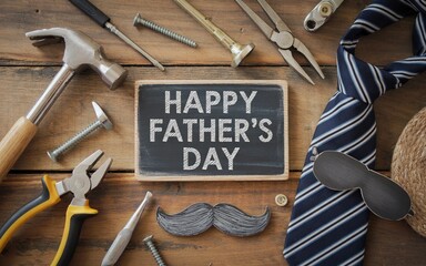 Father's Day celebration theme with dad's tools, tie, and accessories on a rustic wooden background.