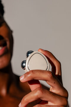 Close-Up of Microcurrent Device in Hand