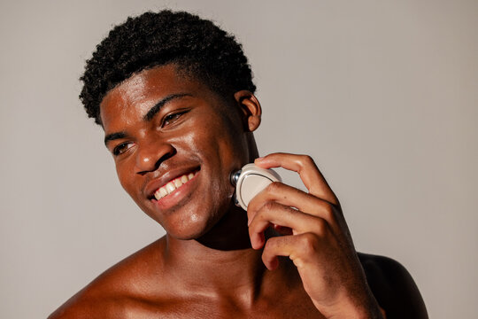 Man Enjoying Facial Massage Therapy