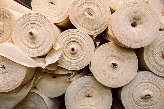rolls with finished fabric in natural color