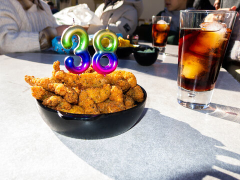 Celebrating 38th birthday with fried chicken and soft drink