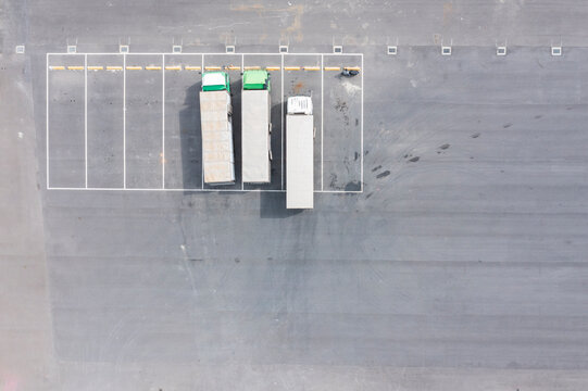 Aerial View Semi Trucks Parked in Logistics Terminal Yard