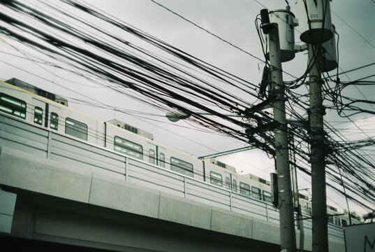 Manila Metro Behind Power Lines on Film