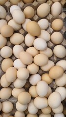 Close up of randomly stacked chicken eggs sold at the market as a background.