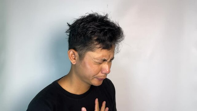 Man in Black T-Shirt Against White Background Showing Various Facial Expressions - Emotion Concept Series