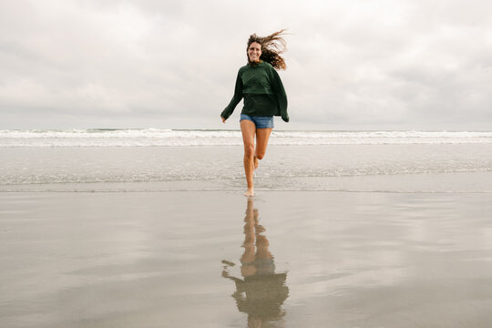 happy young woman on beach