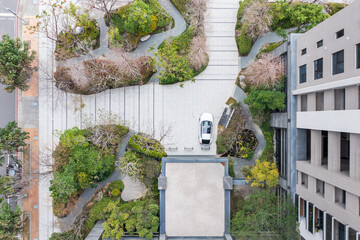Aerial View of Courtyard with Car and Modern Architecture