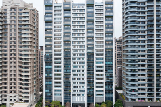 Modern Building with Uniform Facade and Trees