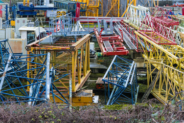 Colourful crane parts in storage