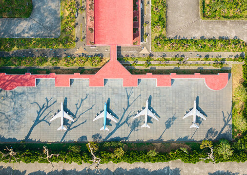 Aerial View of Aircraft Models Display with Tree Shadows Art