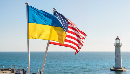 Ukrainian and American flags waving by the lighthouse on the coast  