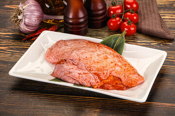 Raw marinated duck breast for cooking