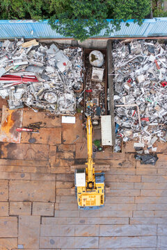 Aerial View of Recycling Plant with Excavator