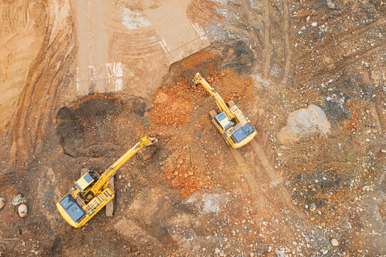 Excavators Working on Earthmoving at Construction Site