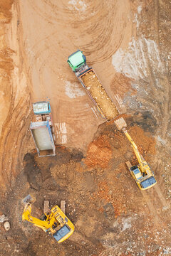 Aerial View Heavy Equipment Working at Construction Site