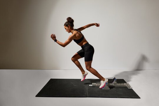 Athlete starting to run from blocks