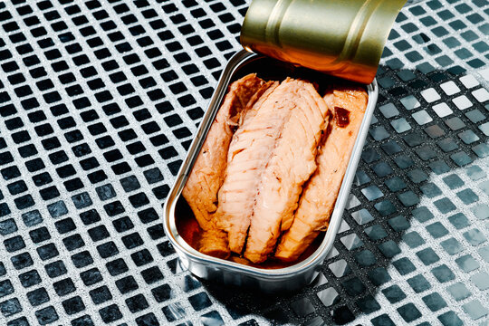 closeup of an open can of frigate tuna fillets