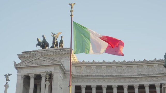 Italian flag and statues of Monument to Vittorio Emanuele II, Rome, Italy