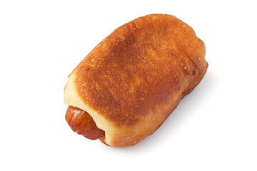 One homemade sausage in dough on a white background. Close-up of sausage in dough.