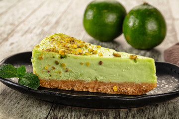Green pistachio cheesecake served mint