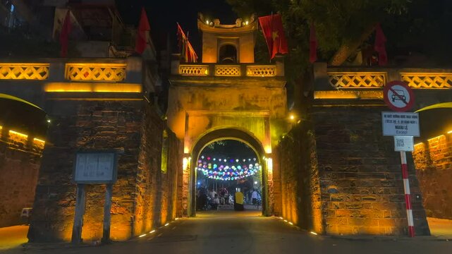 Night view of old city gates. Old town at night. Citadel city gate of Thang Long at night. Night scenery. O Quan Chuong. Ha Noi, Vietnam.