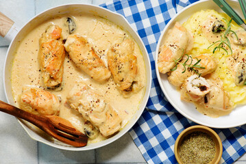 Traditional Ukrainian chicken rolls with prunes in creamy sauce, kruchenyky .top veiw