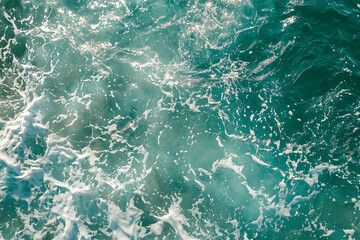 Fototapeta premium Beach and waves from top view. Turquoise water background from top view. Summer seascape from air. Top view from drone. Travel - image 