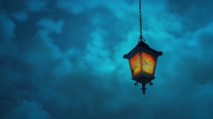 A glowing lantern hangs from a chain against a cloudy sky