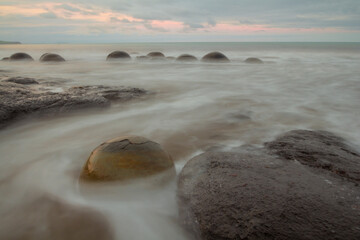 Dinosaur Egg Rocks or Moeraki Rocks are a group of strange rocks formed by natural phenomena of...