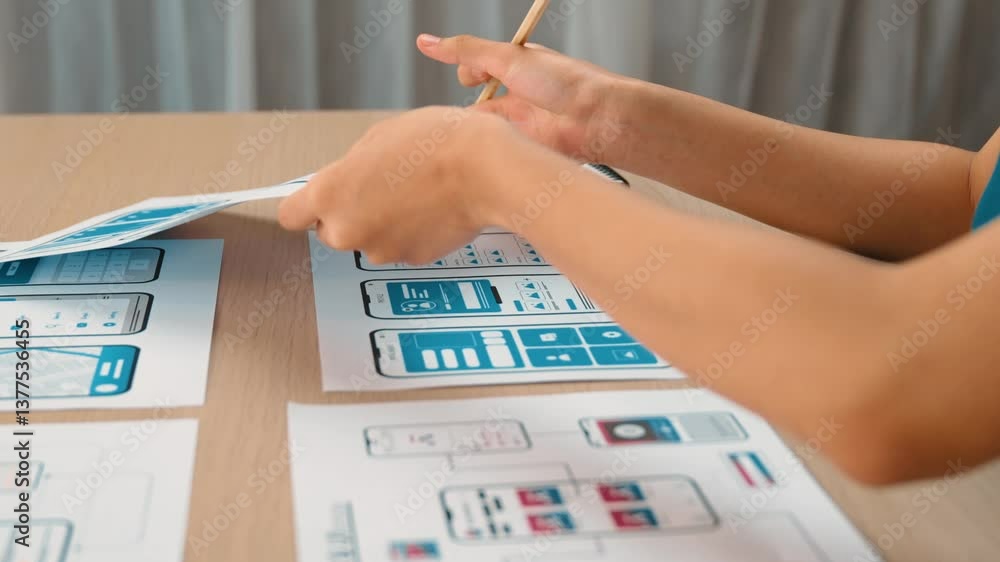 Fototapete startup company employee planning for user interface prototype for mobile application or website in 