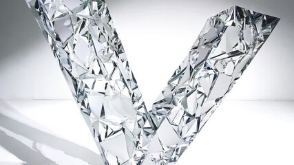Dolly out video of the letter "y" composed of shattered glass against a bright, white studio background, contrasting lighting creates sharp shadows - Powered by Adobe