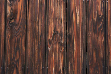 Obraz premium 焦げ目の美しい焼杉・日本の伝統的な外壁素材・背景テクスチャーシリーズ