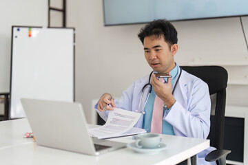 Fototapeta premium Telemedicine and Patient Interaction. A physician utilizing telemedicine tools for effective communication during a patient consultation.
