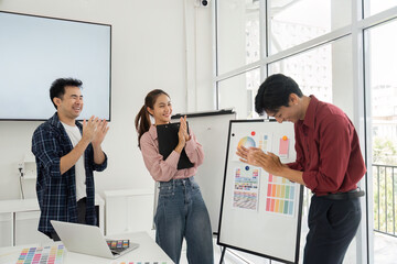 Presenting Ideas and Design Solutions. Team members showcase design concepts and gather feedback...