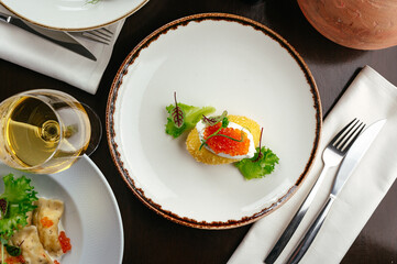 poached egg with cutlet and caviar