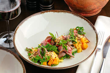 warm salad with beef and pumpkin