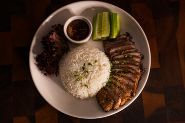 Steamed Rice And Grilled Meat On Plate