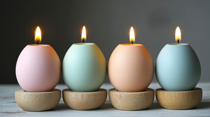 Decorative Egg Shaped Candles on Wooden Holders for Home Ambiance