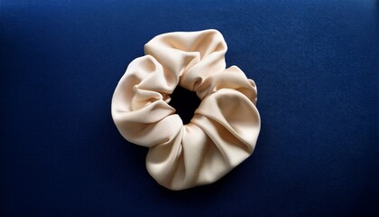hair scrunchie on blue background
