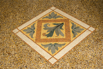 mosaic on the floor of an old hotel in Saint-Cast-Le-Guildo in summer in Côtes d'Armor, Brittany, France