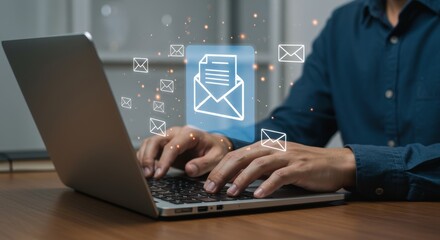 Closeup of hands typing on laptop with floating envelope icons symbolizing emails