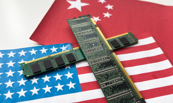 Flag of the Republic of China and the United States on microchips of a printed electronic board. Concept for world supremacy in microchip and semiconductor manufacturing.