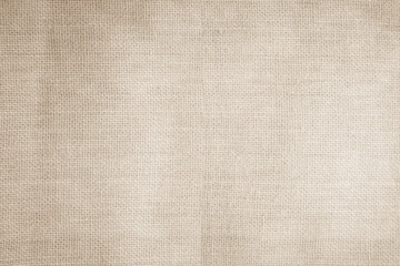 Brown sackcloth woven texture background in natural pattern. Jute hessian burlap, linen background in light beige cream color blank. Weaving canvas fiber line cotton cloth textured as organic.