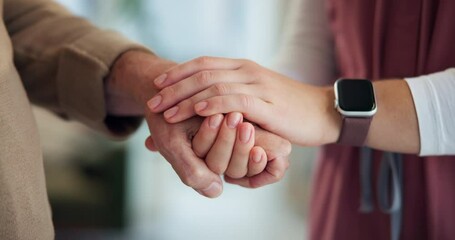 Nurse, holding hands and comfort senior patient in home with cancer diagnosis, help and healthcare. Medical caregiver, support and closeup of people with sorry for illness, palliative care or empathy